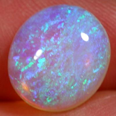 SOLID CRYSTAL OPAL 3D pattern, green over a mauve hue